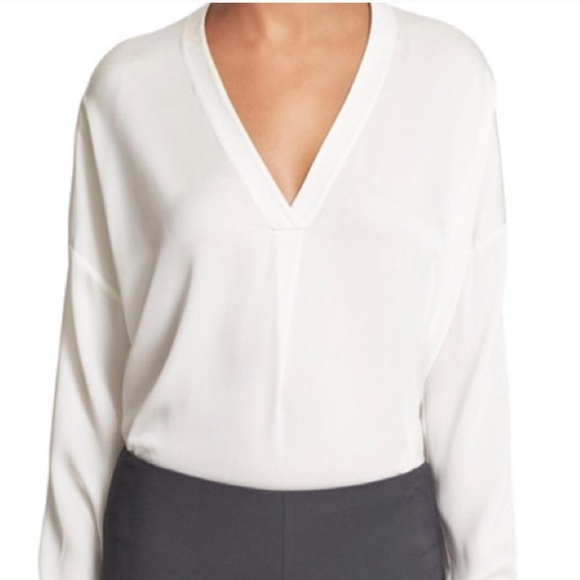 white plunge neck top